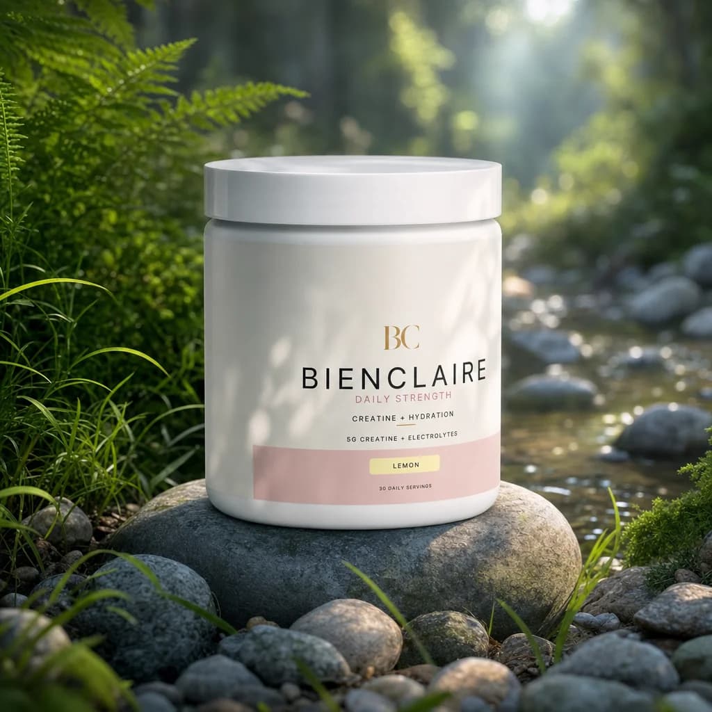 Bienclaire jar on a river stone surrounded by ferns